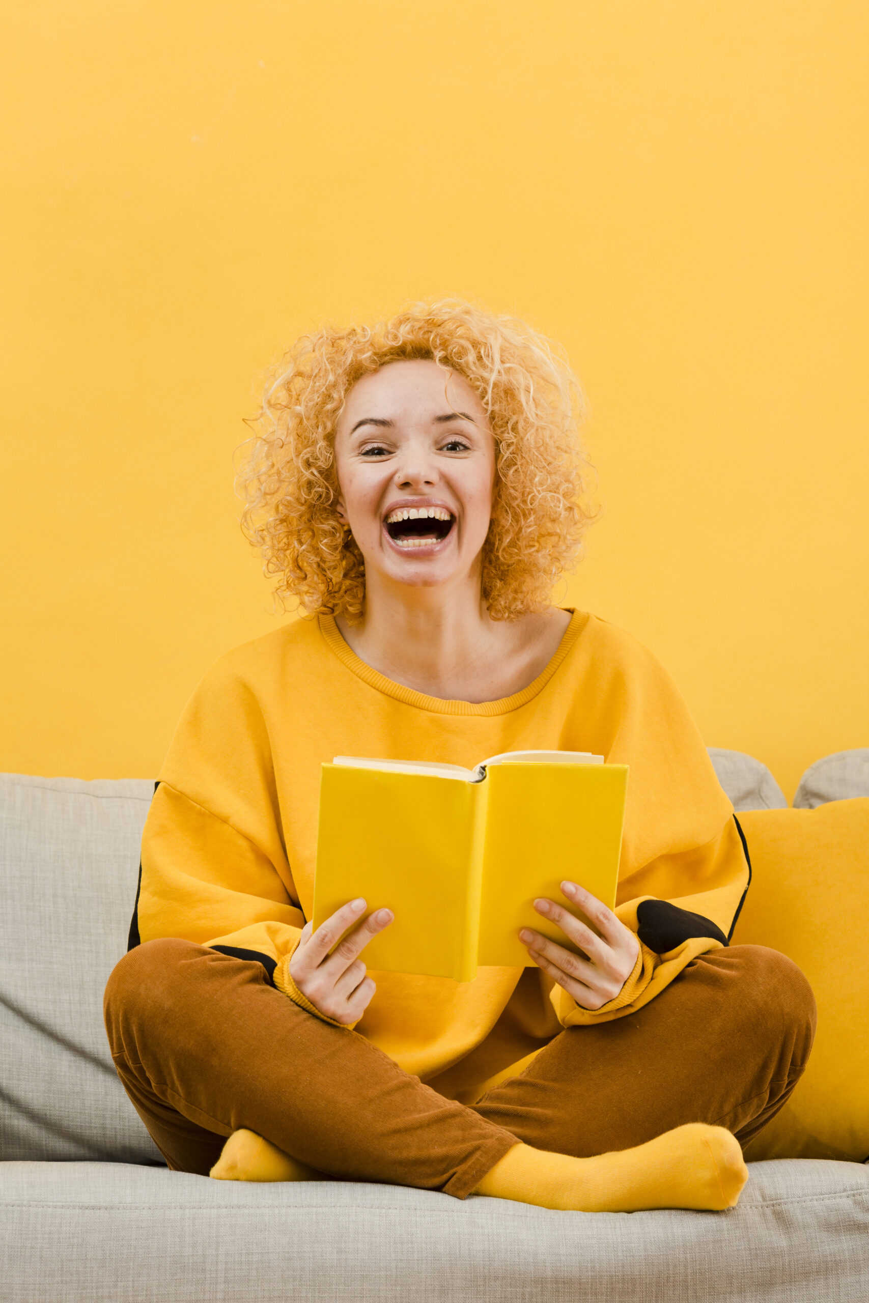 front view blonde woman with book
