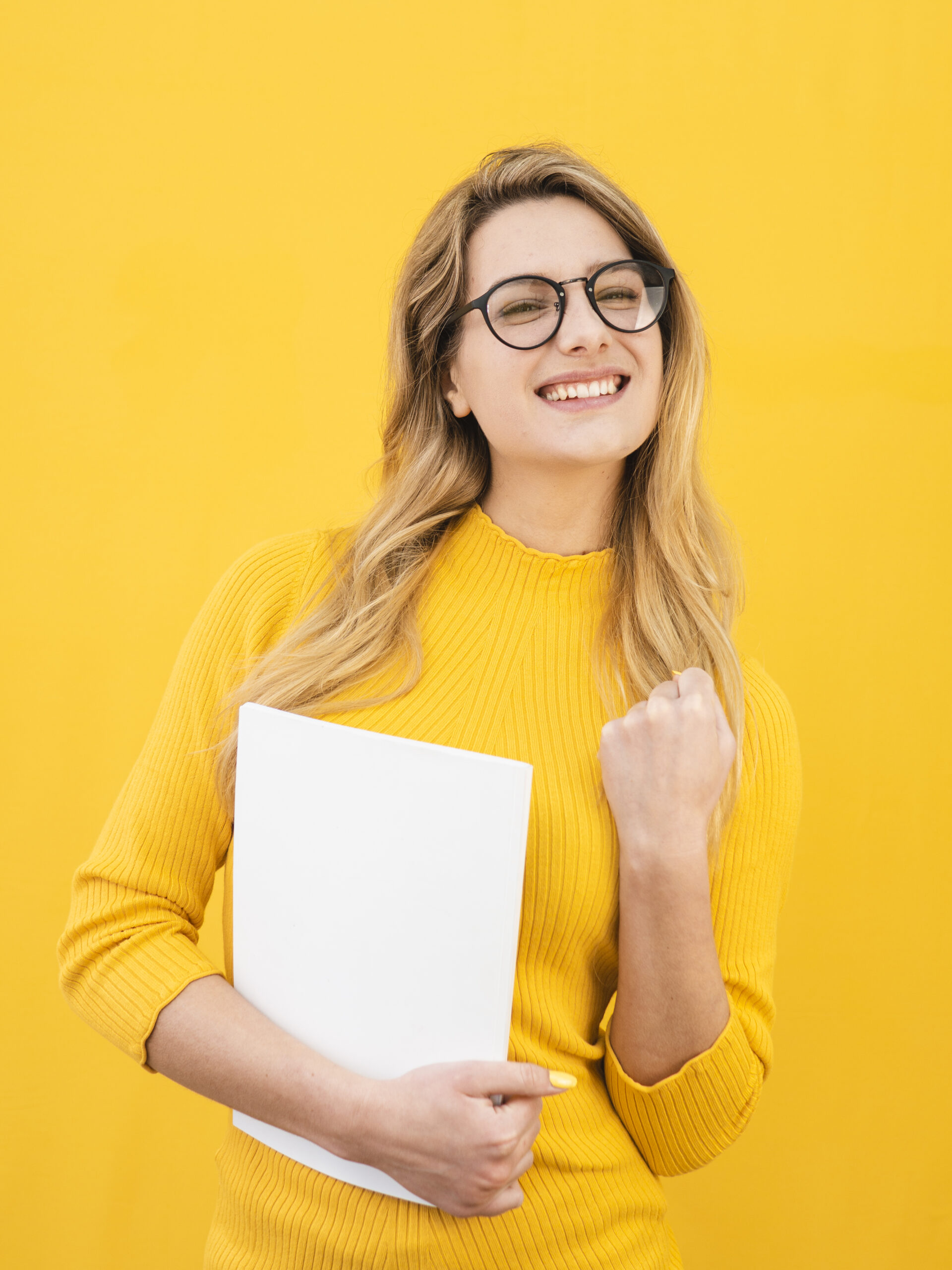 smiley woman wearing glasses